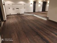 Dunkler Holzboden, professionell verlegt in einer Wohnung durch WyDa Woods GmbH